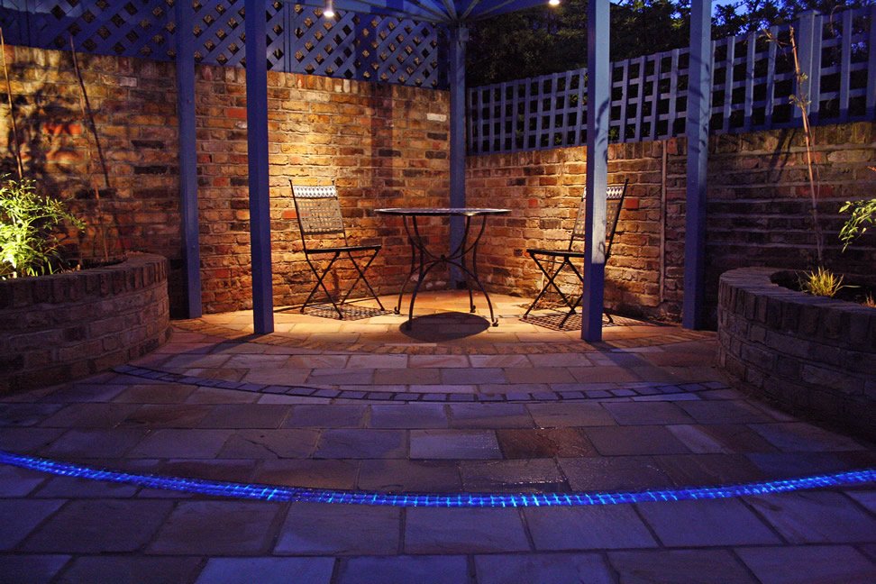 Vibrant but relaxing town garden - at night